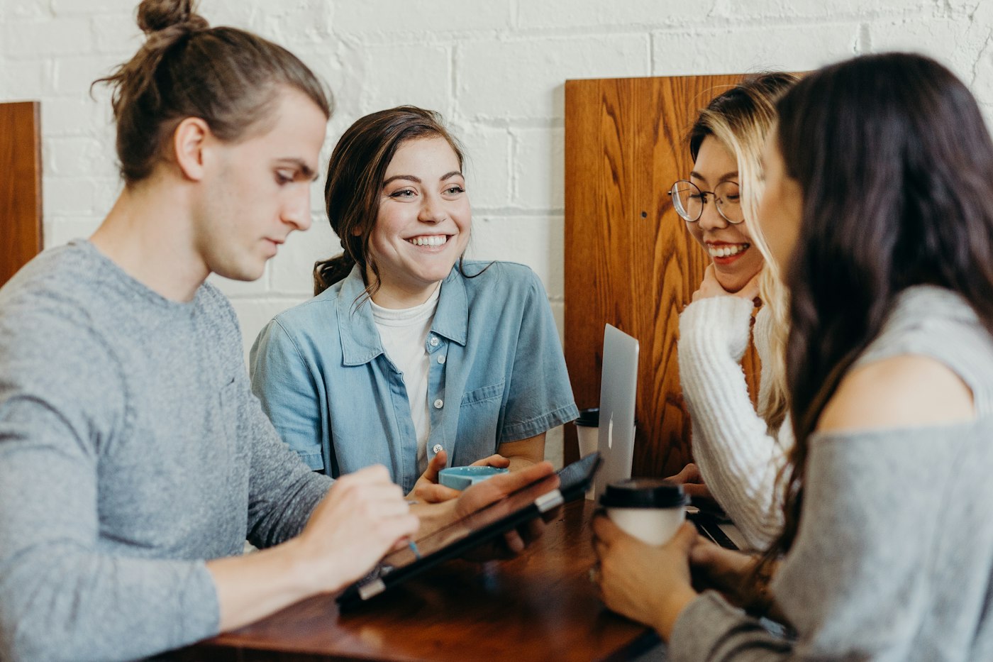 A small group having a face-to-face conversation