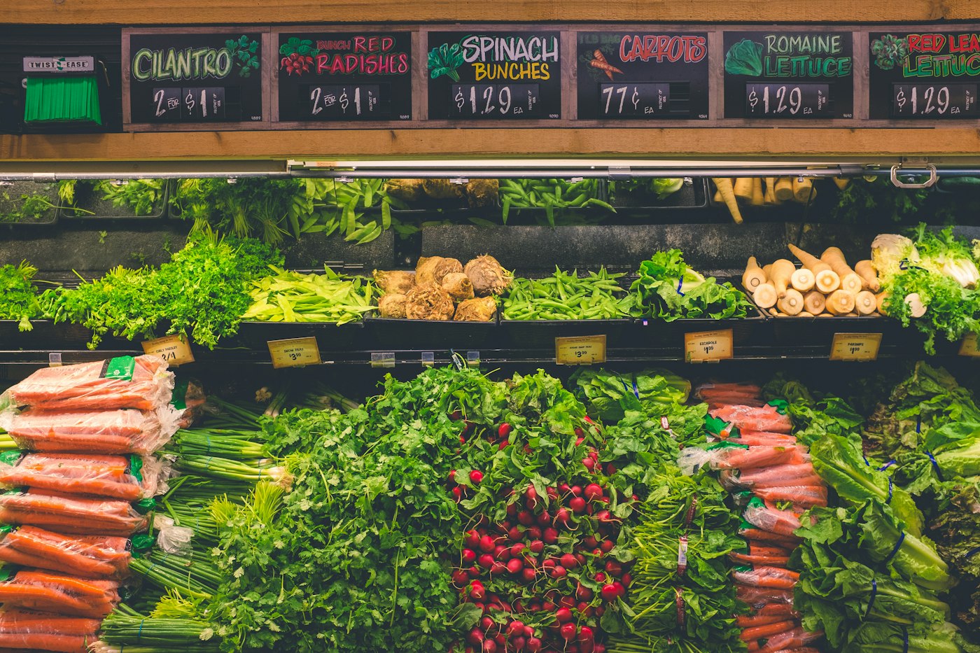 Fresh produce with price labels at a market